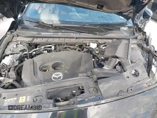 2023 Mazda 3 Premium Plus z VIN JM1BPBNY0P1615814, wystawiony jako IAAI lot #41718577 z przebiegiem Nie podano mil oraz . Historia ofert i sprzedaży dostępna na DreamBid. Obrazek 10.