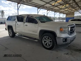 2014 GMC Sierra 1500 SLT with VIN 3GTP1VEC1EG190700, listed as a Copart auction lot 48573715 with 133,563 mi miles and Salvage title. Bid and sale history available at DreamBid. Image 4.