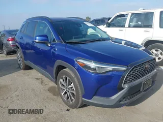 2022 Toyota Corolla Cross XLE with VIN 7MUDAAAG7NV024323, listed as a IAAI auction lot 42643048 with 76,465 mi miles and . Bid and sale history available at DreamBid. Image 1.