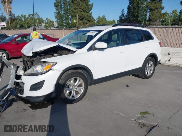 2012 Mazda CX-9 Touring z VIN JM3TB3CVXC0338761, wystawiony jako IAAI lot #42386603 z przebiegiem 166 217 mil mil oraz . Historia ofert i sprzedaży dostępna na DreamBid. Obrazek 2.