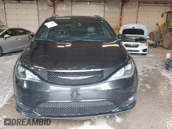 2018 Chrysler Pacifica Touring L z VIN 2C4RC1BG8JR260538, wystawiony jako IAAI lot #42069926 z przebiegiem 167 328 mil mil oraz . Historia ofert i sprzedaży dostępna na DreamBid. Obrazek 13.