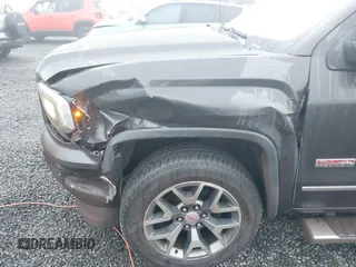 2016 GMC Sierra 1500 SLT with VIN 3GTU2NEC6GG295896, listed as a IAAI auction lot 41230137 with 150,847 mi miles and . Bid and sale history available at DreamBid. Image 6.