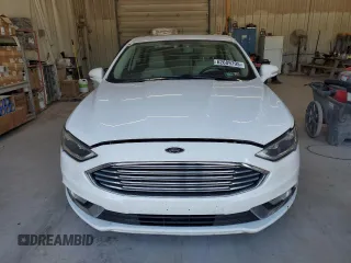 2017 Ford Fusion Hybrid Titanium z VIN 3FA6P0RU3HR400034, wystawiony jako Copart lot #62689795 z przebiegiem 109 118 mil mil oraz Szkoda całkowita • Salvage title. Historia ofert i sprzedaży dostępna na DreamBid. Obrazek 5.