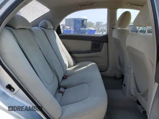 2006 Kia Spectra EX with VIN KNAFE121865277527, listed as a Copart auction lot 74613214 with 123,368 mi miles and Salvage Title. Bid and sale history available at carsss.com. Image 10.