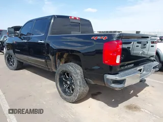 2016 Chevrolet Silverado 1500 LTZ with VIN 3GCUKSEJ5GG134114, listed as a IAAI auction lot 41939173 with 166,890 mi miles. Bid and sale history available at carsss.com. Image 3.
