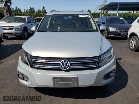 2012 Volkswagen Tiguan SEL with VIN WVGAV7AXXCW521394, listed as a Copart auction lot 53000555 with 126,017 mi miles and Salvage Title. Bid and sale history available at DreamBid. Image 5.