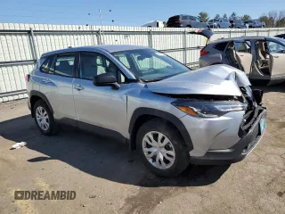 2022 Toyota Corolla Cross L with VIN 7MUAAABG0NV011057, listed as a Copart auction lot 50907545 with 59,328 mi miles and Salvage title. Bid and sale history available at DreamBid. Image 4.
