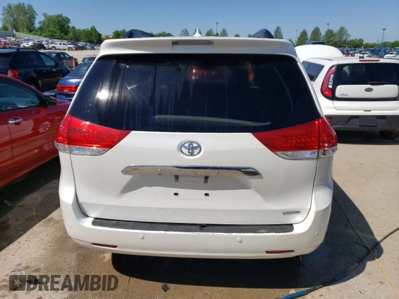 2014 Toyota Sienna XLE with VIN 5TDYK3DC6ES427920, listed as a Copart auction lot 54075594 with 127,018 mi miles and Salvage title. Bid and sale history available at DreamBid. Image 6.