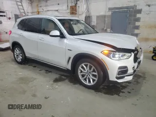 2022 BMW X5 xDrive45e with VIN 5UXTA6C02N9L87936, listed as a Copart auction lot 52728515 with 22,228 mi miles and Salvage Title. Bid and sale history available at carsss.com. Image 4.