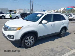 2013 Kia Sorento LX with VIN 5XYKT3A61DG317094, listed as a IAAI auction lot 42747947 with 235,917 mi miles and . Bid and sale history available at DreamBid. Image 2.