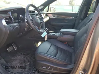 2023 Cadillac XT6 AWD Sport z VIN 1GYKPHRSXPZ181132, wystawiony jako Copart lot #50512825 z przebiegiem 17 302 mil mil oraz Szkody całkowita. Historia ofert i sprzedaży dostępna na DreamBid. Obrazek 7.