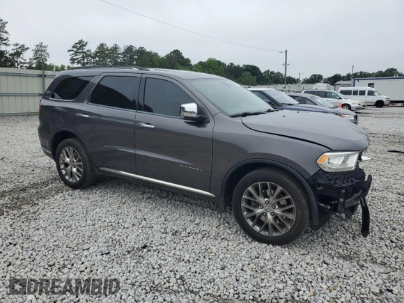 2014 Dodge Durango Citadel with VIN 1C4SDJET9EC435191, listed as a Copart auction lot 58572665 with 168,478 mi miles and Salvage title. Bid and sale history available at DreamBid. Image 4.