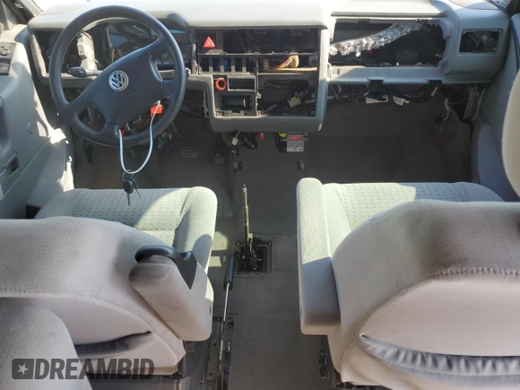 2000 Volkswagen EuroVan с VIN WV2MH4703YH013265, выставлен на аукционе Copart как лот 59003645 с пробегом Не указан миль и Списание • Salvage title. История ставок и продаж доступна на DreamBid. Изображение 8.