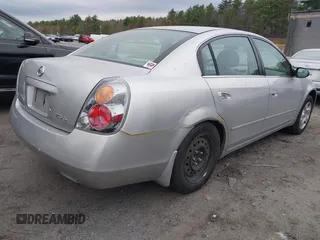 2003 Nissan Altima S with VIN 1N4AL11D33C265538, listed as a IAAI auction lot 42082079 with 180,138 mi miles. Bid and sale history available at carsss.com. Image 4.