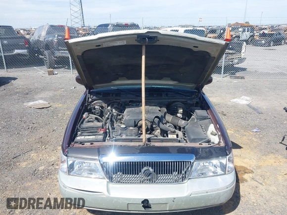 2003 Mercury Grand Marquis LS Premium z VIN 2MEFM75W73X650193, wystawiony jako IAAI lot #41803310 z przebiegiem 151 719 mil mil oraz . Historia ofert i sprzedaży dostępna na DreamBid. Obrazek 10.