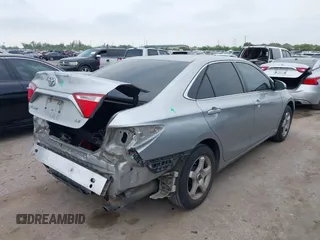 2015 Toyota Camry XLE with VIN 4T4BF1FKXFR472201, listed as a IAAI auction lot 41883944 with 143,296 mi miles and . Bid and sale history available at DreamBid. Image 4.