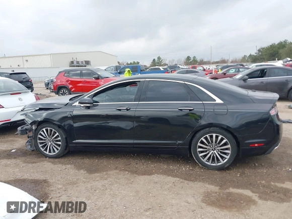 2018 Lincoln MKZ Select z VIN 3LN6L5C93JR620170, wystawiony jako IAAI lot #41488730 z przebiegiem 101 040 mil mil oraz . Historia ofert i sprzedaży dostępna na DreamBid. Obrazek 15.