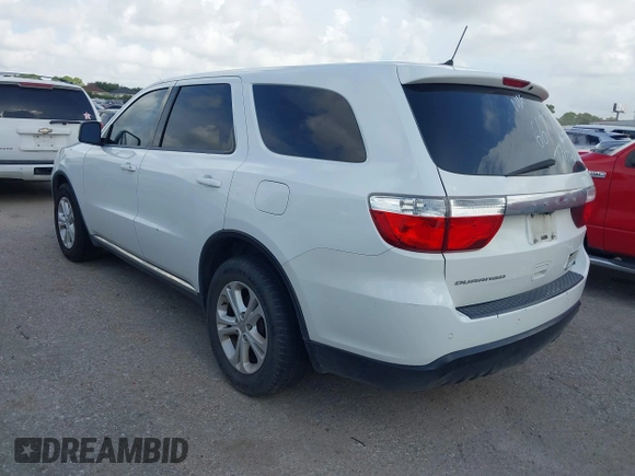 2013 Dodge Durango SXT with VIN 1C4RDHAG4DC667776, listed as a IAAI auction lot 42656299 with 204,181 mi miles and . Bid and sale history available at DreamBid. Image 3.