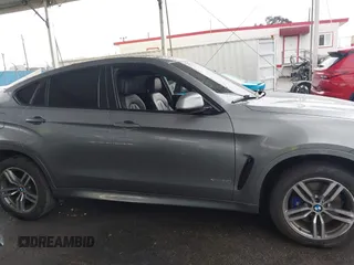 2016 BMW X6 xDrive50i with VIN 5UXKU6C59G0S82526, listed as a IAAI auction lot 41786622 with 110,796 mi miles and . Bid and sale history available at DreamBid. Image 12.