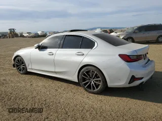 2020 BMW 3 Series 330i with VIN WBA5R1C05LFJ05290, listed as a Copart auction lot 48253655 with Not Provided miles and Salvage Title. Bid and sale history available at DreamBid. Image 2.