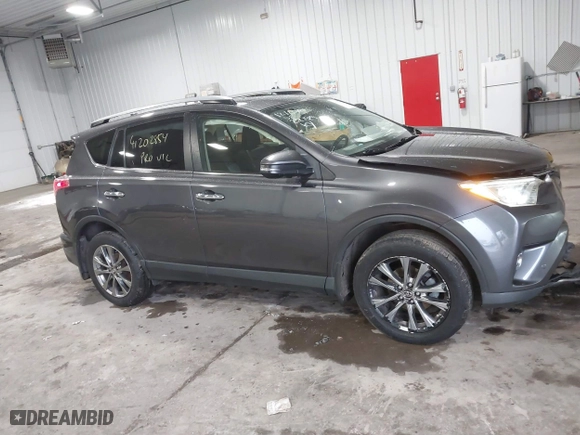 2018 Toyota RAV4 Limited with VIN JTMDFREV7JJ212799, listed as a IAAI auction lot 41202854 with 120,705 mi miles. Bid and sale history available at carsss.com. Image 13.