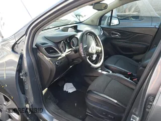 2015 Buick Encore with VIN KL4CJASB3FB168155, listed as a IAAI auction lot 41861563 with 57,574 mi miles. Bid and sale history available at carsss.com. Image 15.