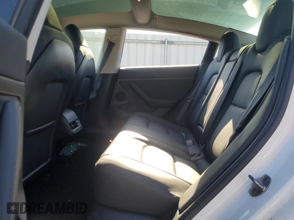 2023 Tesla Model 3 with VIN 5YJ3E1EA1PF556562, listed as a Copart auction lot 48413235 with 11,980 mi miles and Salvage Title. Bid and sale history available at DreamBid. Image 10.
