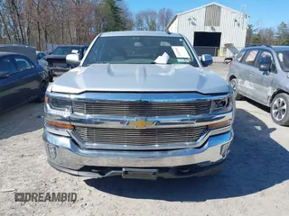 2018 Chevrolet Silverado 1500 LT with VIN 1GCVKREH4JZ323242, listed as a IAAI auction lot 41971945 with 63,915 mi miles and . Bid and sale history available at DreamBid. Image 12.