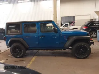 2021 Jeep Wrangler Unlimited Sport S with VIN 1C4HJXDG9MW797013, listed as a IAAI auction lot 41966754 with 53,583 mi miles. Bid and sale history available at carsss.com. Image 14.