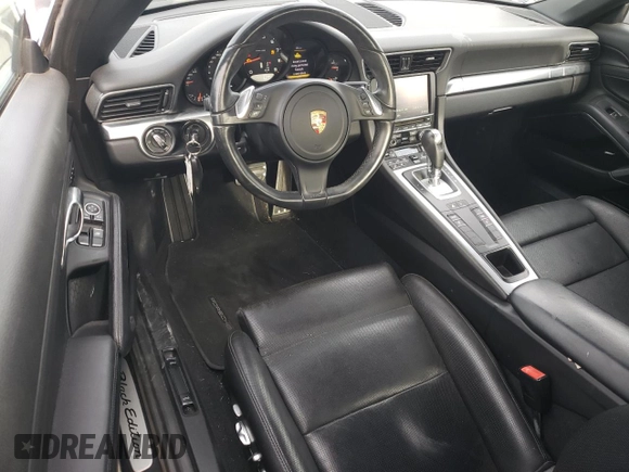 2016 Porsche 911 Carrera with VIN WP0AA2A91GS106403, listed as a Copart auction lot 83393454 with 115,592 mi miles and Salvage title. Bid and sale history available at DreamBid. Image 8.