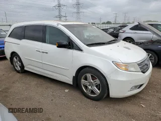2012 Honda Odyssey Touring with VIN 5FNRL5H92CB047020, listed as a Copart auction lot 56539795 with 155,788 mi miles and Clean Title. Bid and sale history available at DreamBid. Image 4.