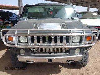 2005 Hummer H2 SUV with VIN 5GRGN23U25H107505, listed as a IAAI auction lot 41703768 with 213,723 mi miles. Bid and sale history available at carsss.com. Image 6.