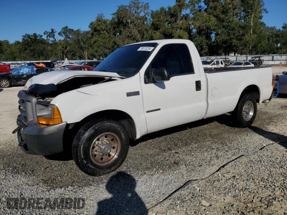 2000 Ford Super Duty F-250 XL with VIN 1FTNF20F9YEC91357, listed as a Copart auction lot 76673234 with 318,306 mi miles and Salvage Title. Bid and sale history available at carsss.com. Image 1.