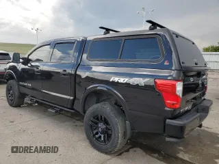 2019 Nissan Titan Pro-4X z VIN 1N6AA1E53KN508400, wystawiony jako Copart lot #54344865 z przebiegiem 59 028 mil mil oraz Szkoda całkowita • Salvage title. Historia ofert i sprzedaży dostępna na DreamBid. Obrazek 2.