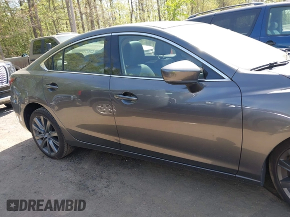 2021 Mazda 6 Grand Touring with VIN JM1GL1TY4M1600534, listed as a IAAI auction lot 42012560 with Not Provided miles. Bid and sale history available at carsss.com. Image 12.