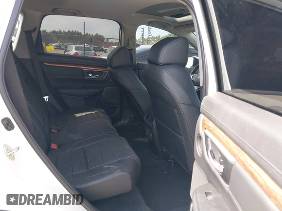 2020 Honda CR-V Touring z VIN 2HKRW2H9XLH623380, wystawiony jako IAAI lot #42039028 z przebiegiem 59 795 mil mil oraz . Historia ofert i sprzedaży dostępna na DreamBid. Obrazek 8.