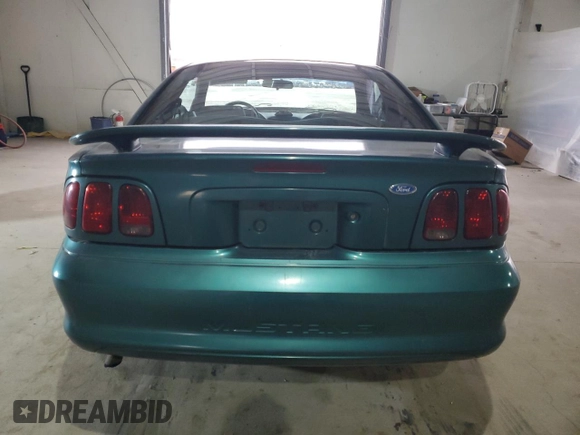 1996 Ford Mustang with VIN 1FALP4047TF229334, listed as a Copart auction lot 49257335 with 184,986 mi miles and Salvage Title. Bid and sale history available at carsss.com. Image 6.