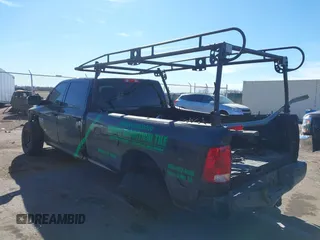 2016 Ram 2500 Tradesman with VIN 3C6UR5HJ2GG362507, listed as a IAAI auction lot 41692734 with 128,452 mi miles and . Bid and sale history available at DreamBid. Image 3.