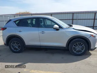 2019 Mazda CX-5 Sport with VIN JM3KFBBM6K1582760, listed as a IAAI auction lot 41822152 with 60,620 mi miles and . Bid and sale history available at DreamBid. Image 13.