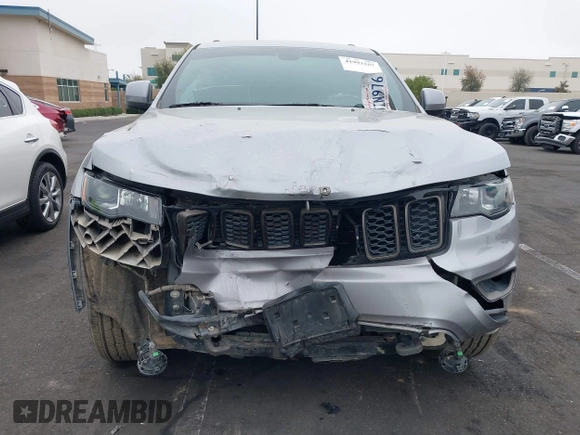 2016 Jeep Grand Cherokee Laredo z VIN 1C4RJFAG3GC457431, wystawiony jako IAAI lot #41993167 z przebiegiem 61 427 mil mil oraz . Historia ofert i sprzedaży dostępna na DreamBid. Obrazek 6.