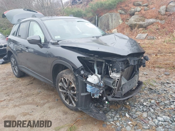 2016 Mazda CX-5 Grand Touring with VIN JM3KE4DY1G0743897, listed as a IAAI auction lot 41935796 with 167,150 mi miles and . Bid and sale history available at carsss.com. Image 1.
