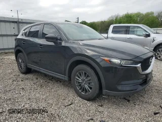 2019 Mazda CX-5 Sport with VIN JM3KFABM5K1500964, listed as a Copart auction lot 51710285 with 87,171 mi miles and Salvage Title. Bid and sale history available at DreamBid. Image 4.