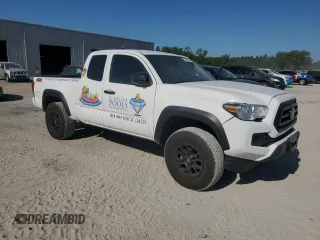 2022 Toyota Tacoma SR with VIN 3TYRX5GN5NT065551, listed as a Copart auction lot 57867435 with 51,120 mi miles and Salvage title. Bid and sale history available at DreamBid. Image 4.