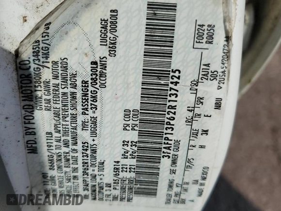 2002 Ford Escort Fleet Standard z VIN 3FAFP13P62R137425, wystawiony jako Copart lot #72697334 z przebiegiem 137 921 mil mil oraz Szkoda całkowita • Salvage title. Historia ofert i sprzedaży dostępna na DreamBid. Obrazek 14.