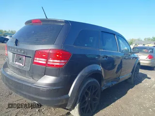 2015 Dodge Journey SE z VIN 3C4PDCAB4FT675074, wystawiony jako IAAI lot #42059878 z przebiegiem 99 947 mil mil oraz . Historia ofert i sprzedaży dostępna na DreamBid. Obrazek 4.