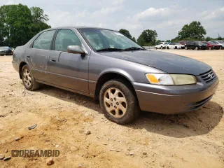 1999 Toyota Camry LE z VIN JT2BF22K5X0208248, wystawiony jako Copart lot #59916165 z przebiegiem 329 883 mil mil oraz Szkoda całkowita • Salvage title. Historia ofert i sprzedaży dostępna na DreamBid. Obrazek 4.