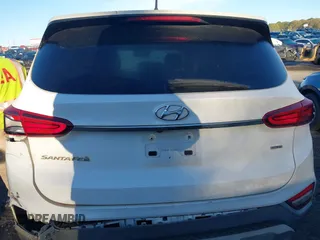 2019 Hyundai Santa Fe SE with VIN 5NMS2CAD6KH114027, listed as a IAAI auction lot 41874556 with 125,729 mi miles. Bid and sale history available at carsss.com. Image 16.