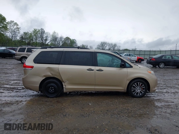 2014 Toyota Sienna XLE with VIN 5TDYK3DC1ES416999, listed as a IAAI auction lot 41972378 with 119,179 mi miles. Bid and sale history available at carsss.com. Image 13.