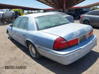 2000 Mercury Grand Marquis LS z VIN 2MEFM75W8YX660478, wystawiony jako IAAI lot #42289748 z przebiegiem 237 860 mil mil oraz . Historia ofert i sprzedaży dostępna na DreamBid. Obrazek 3.