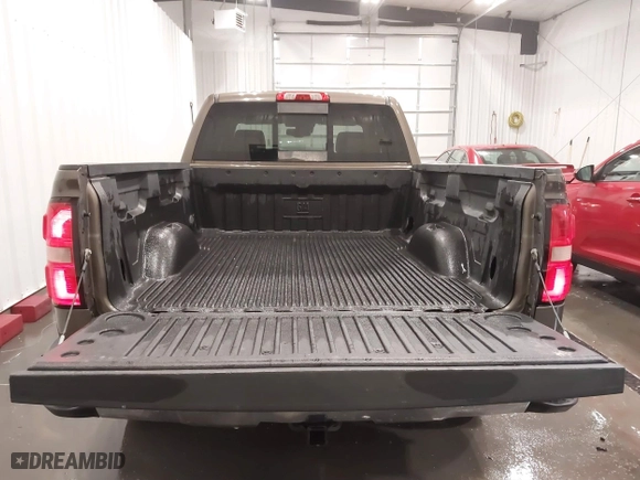2014 GMC Sierra 1500 SLT with VIN 1GTV2VEC9EZ153530, listed as a IAAI auction lot 41647250 with 124,171 mi miles. Bid and sale history available at carsss.com. Image 18.